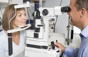 Optometrist in exam room